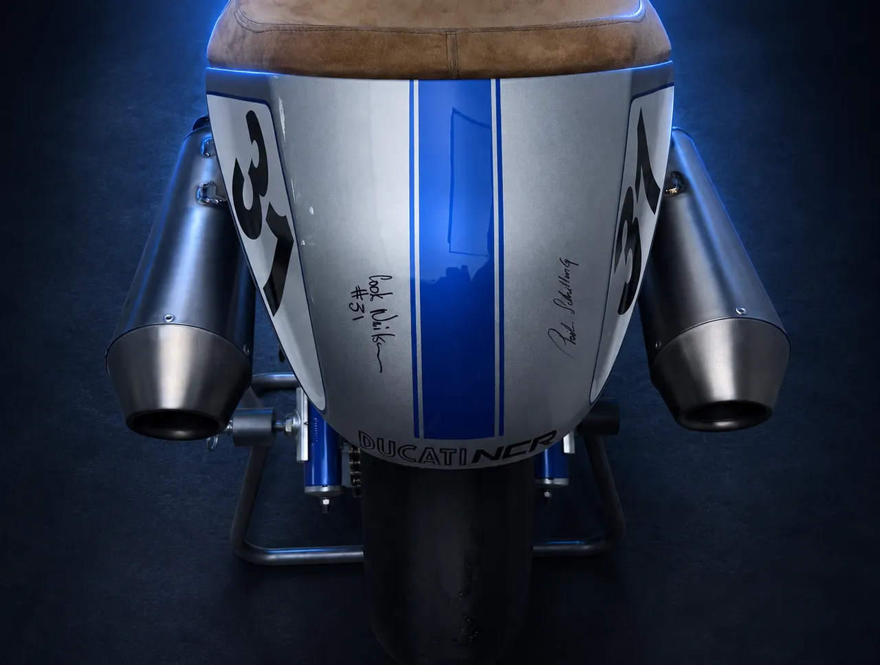 The signed tail of number twelve, both signatures across the stripe
