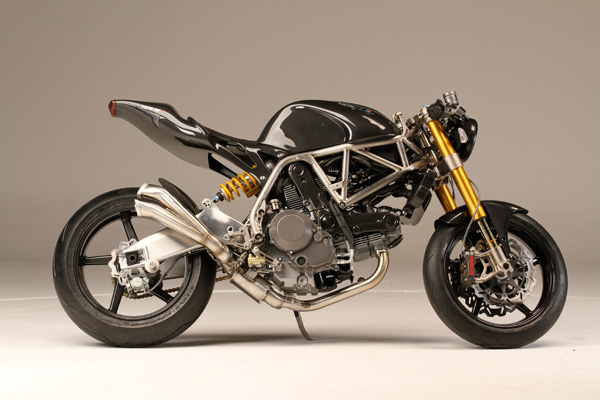 The M4 in profile, exhaust and swingarm along the flank